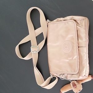 Small Pink Metallic Kipling cross body bag